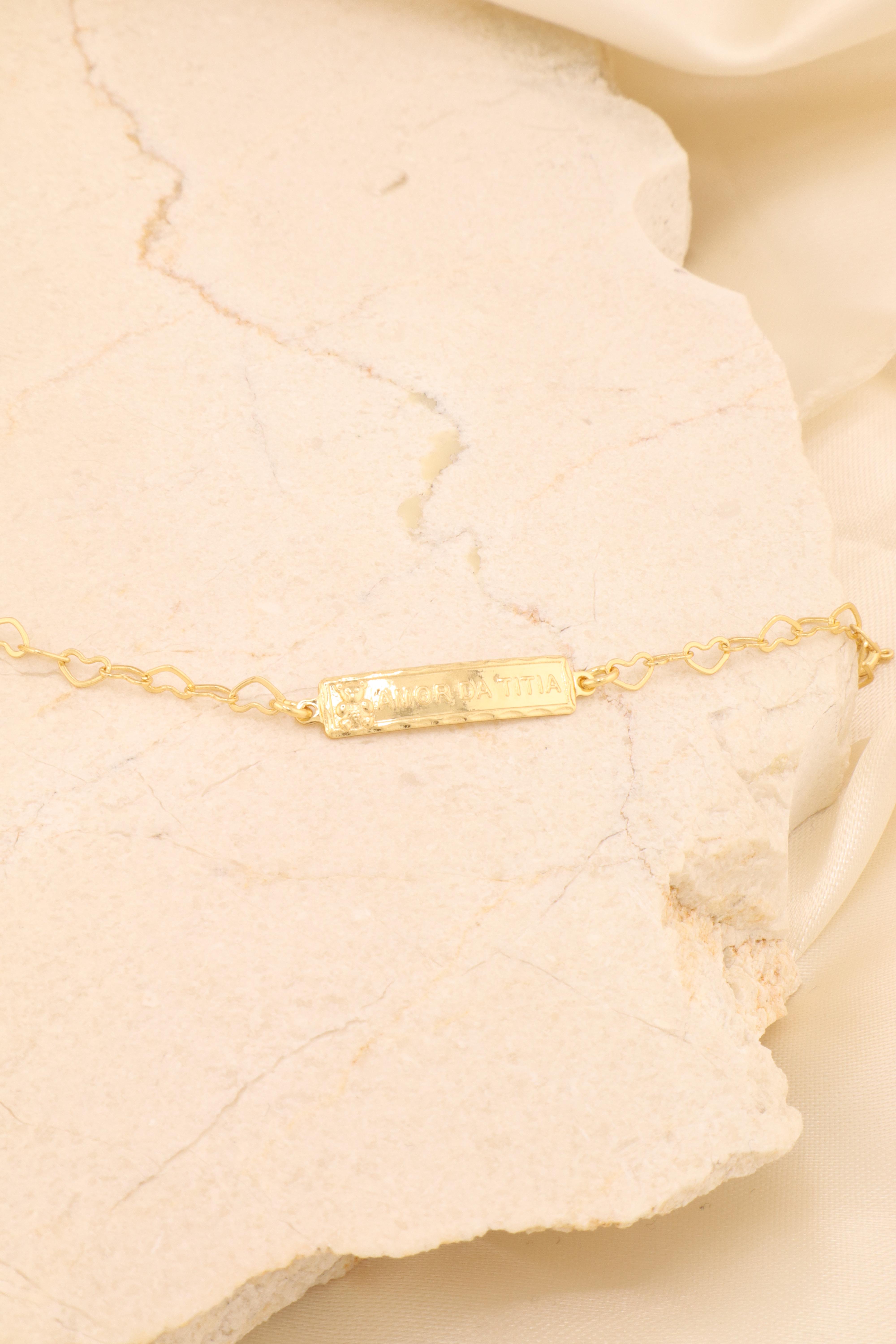 PULSEIRA INFANTIL ELO CORAÇÃO COM PLACA "AMOR DA TITIA"